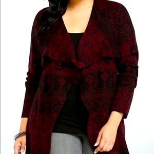 Open front skull cardigan.